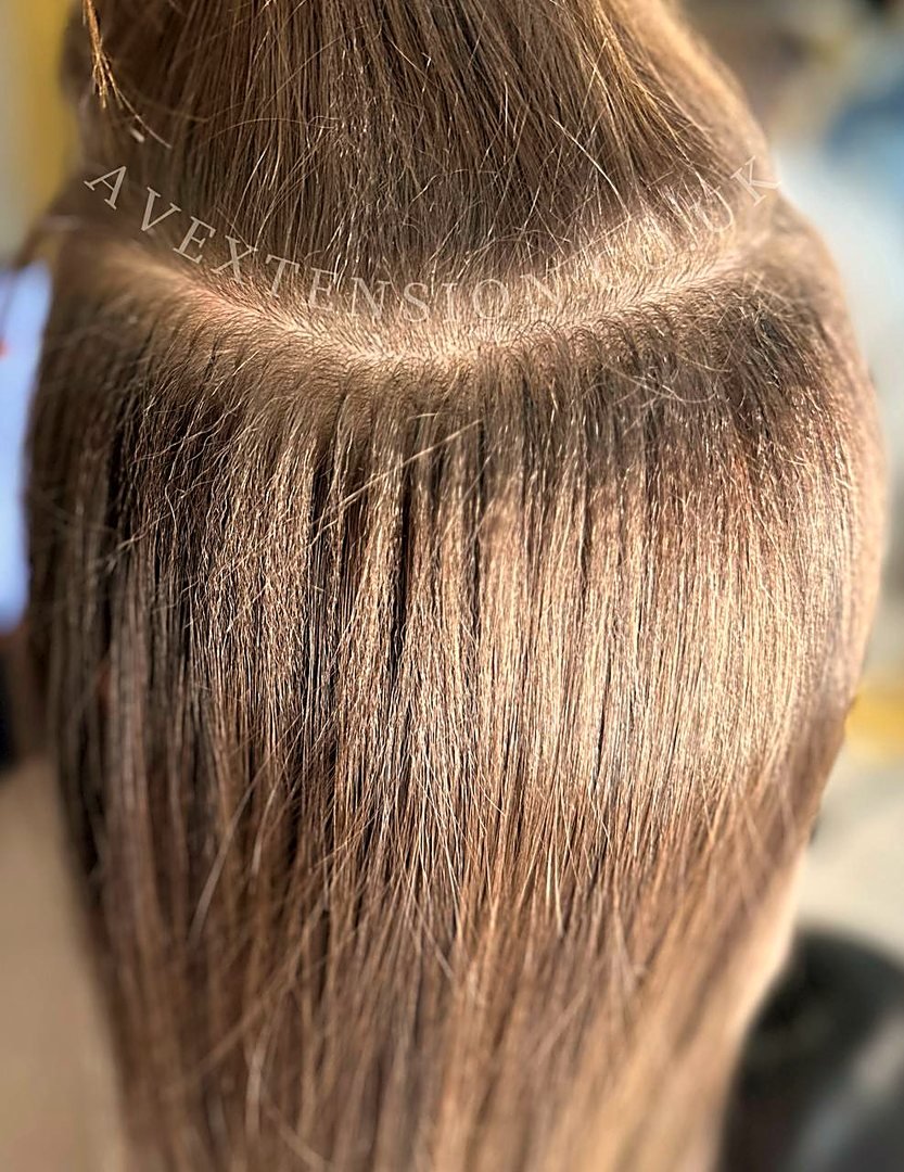 Neat rows of micro bond capsules at the root protecting natural hair growth, AV Extension London